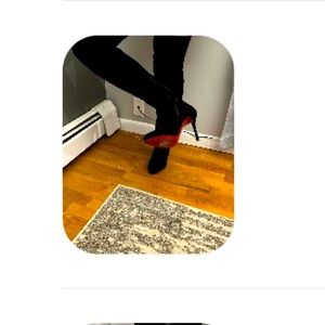 Christian Louboutin iconic over the knee boots used 2 times.